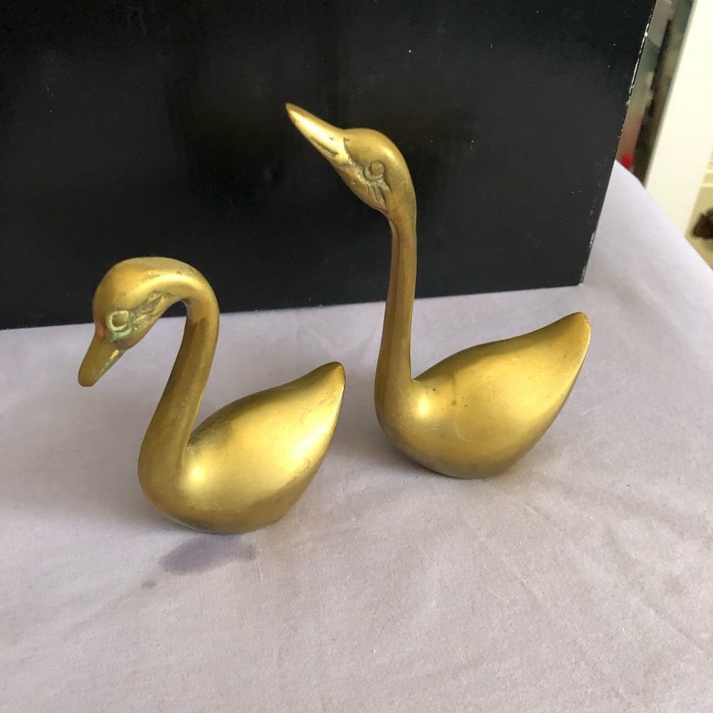 Small brass geese